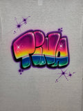 Original hand-airbrushed Tina artwork on white cotton: rainbow bubble letters, purple outlines and star accents, with white highlights.