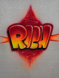 Original hand-airbrushed Rich name artwork in red, orange and yellow with black dimensional lettering and red pointed flare accents on white fabric.