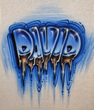 Original airbrushed David lettering in shaded icy blue block letters with white highlights, black shadows and long icicle drips on light fabric.