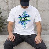Seated-model styling mockup of a white T-shirt with original hand-painted Josh lettering, blue and green swirls, dots and white star highlights.