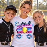 Softball Mom airbrush shirt mockup with personalized Bryce and Katie names and numbers, worn by a mom with two children in ball uniforms.