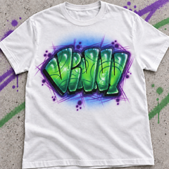 Styled mockup of a white Vinny graffiti name shirt with green lettering, blue shading and purple angular accents on concrete with matching spray-paint marks.